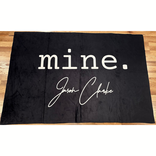 JASON CLARKE Black Throw Blanket with "mine." Logo