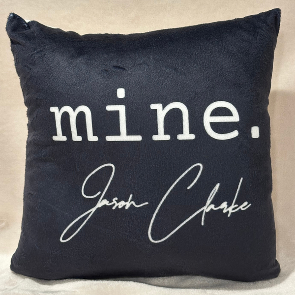 JASON CLARKE Small Black Throw Pillow with "mine." Logo