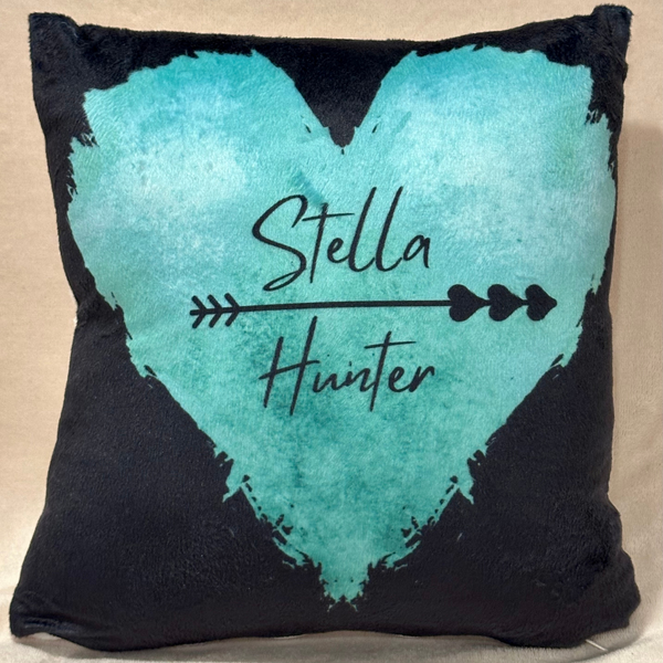 STELLA HUNTER Small Black Throw Pillow with Teal Heart Logo